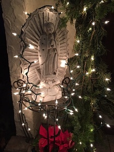 Our Lady of Guadalupe greets visitors at my door during the Christmas season. She brings the message for all people, to see the miracles they witness in their lives.